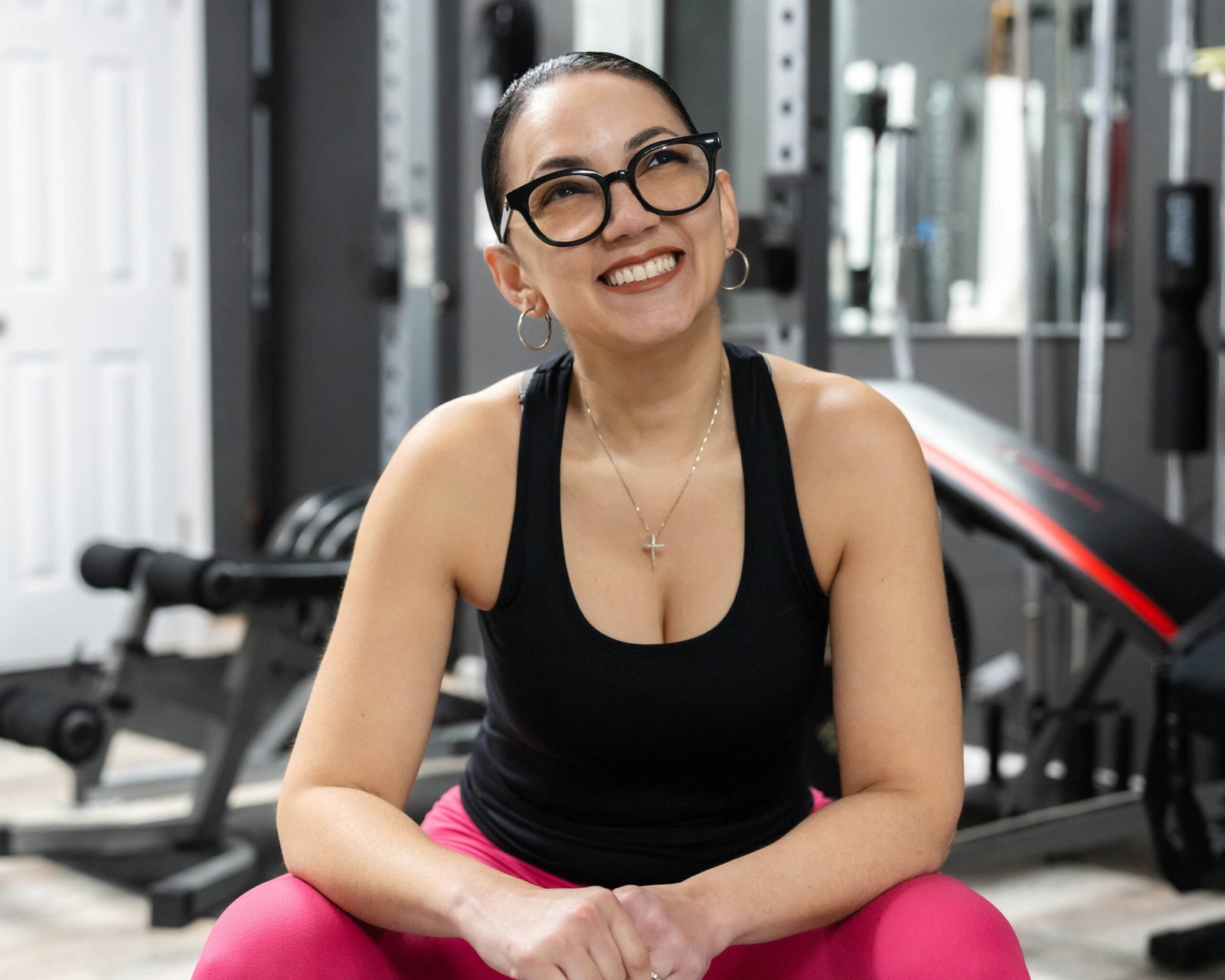 Athletic woman working out at the gym representing strength and confidence, Empower RF women's wellness at ABL Med Spa Round Rock TX